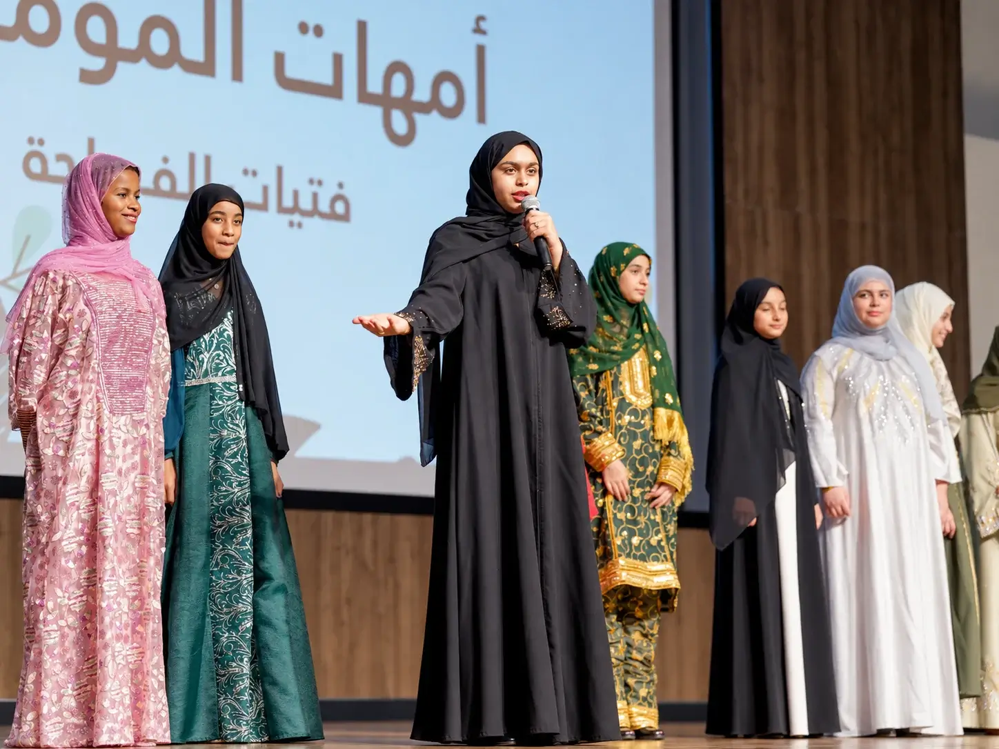 Mothers on stage at an Al Fasaha Private School community event