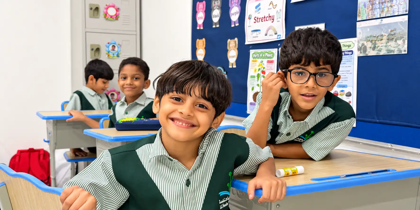 A.F.S Grade 2 pupils smiling in their classroom
